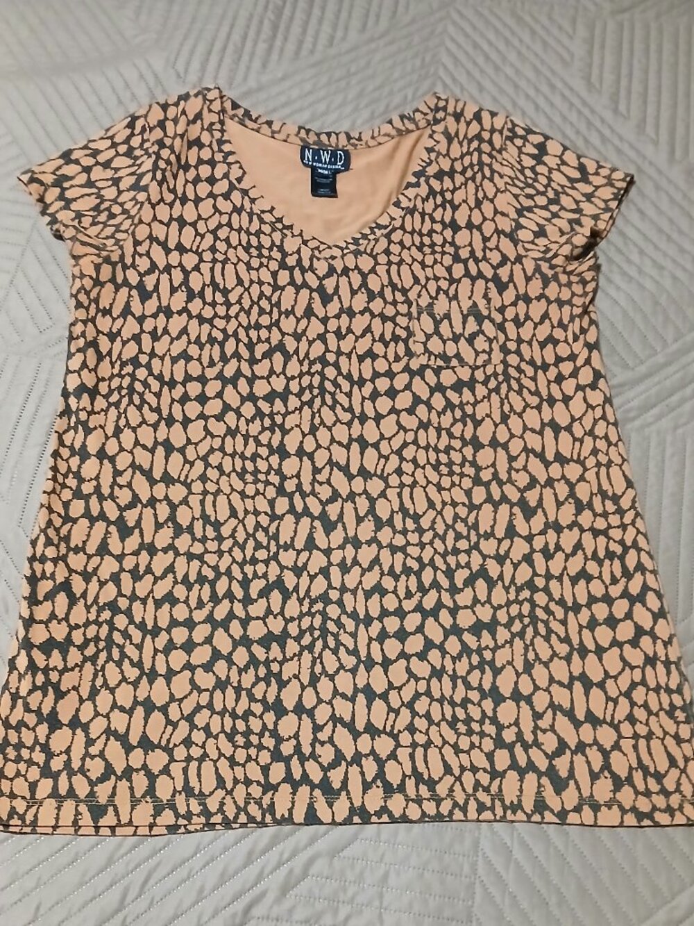 NWD New Woman Design top with a unique print. It's a size M/M (medium).